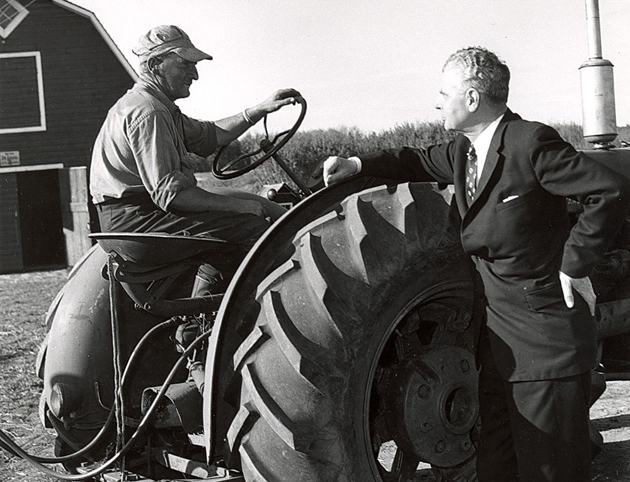  John Diefenbaker chatting with a farmer 