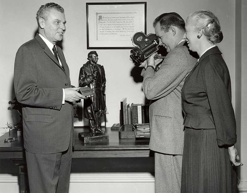 John Diefenbaker holding a plaque in Prime Minister’s Office