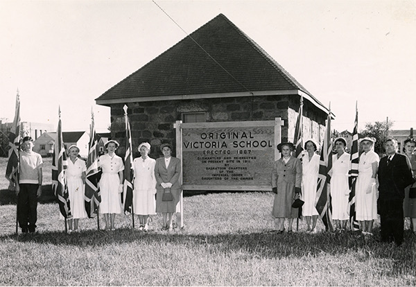 A group of I.O.D.E women in front of the Little Stone School in 1967. Saskatoon Public Library LH-661