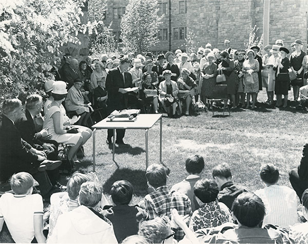 Mayor Sidney L. Buckwold speaking at the Official Re-Opening of the Little Stone School. Saskatoon Public Library LH-1174.