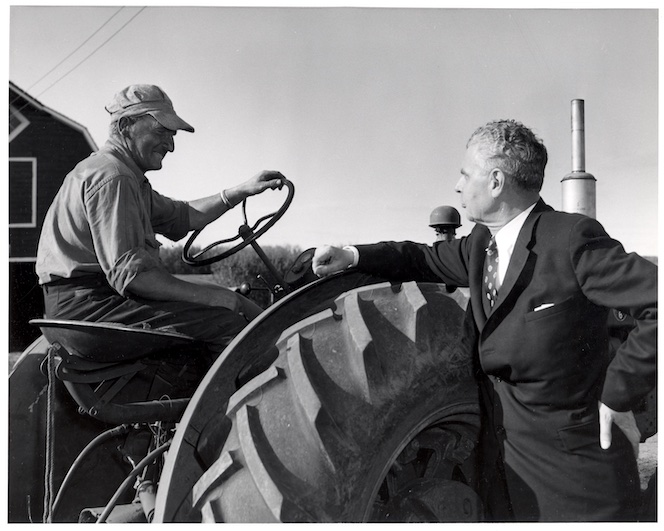 John Diefenbaker chatting with a farmer