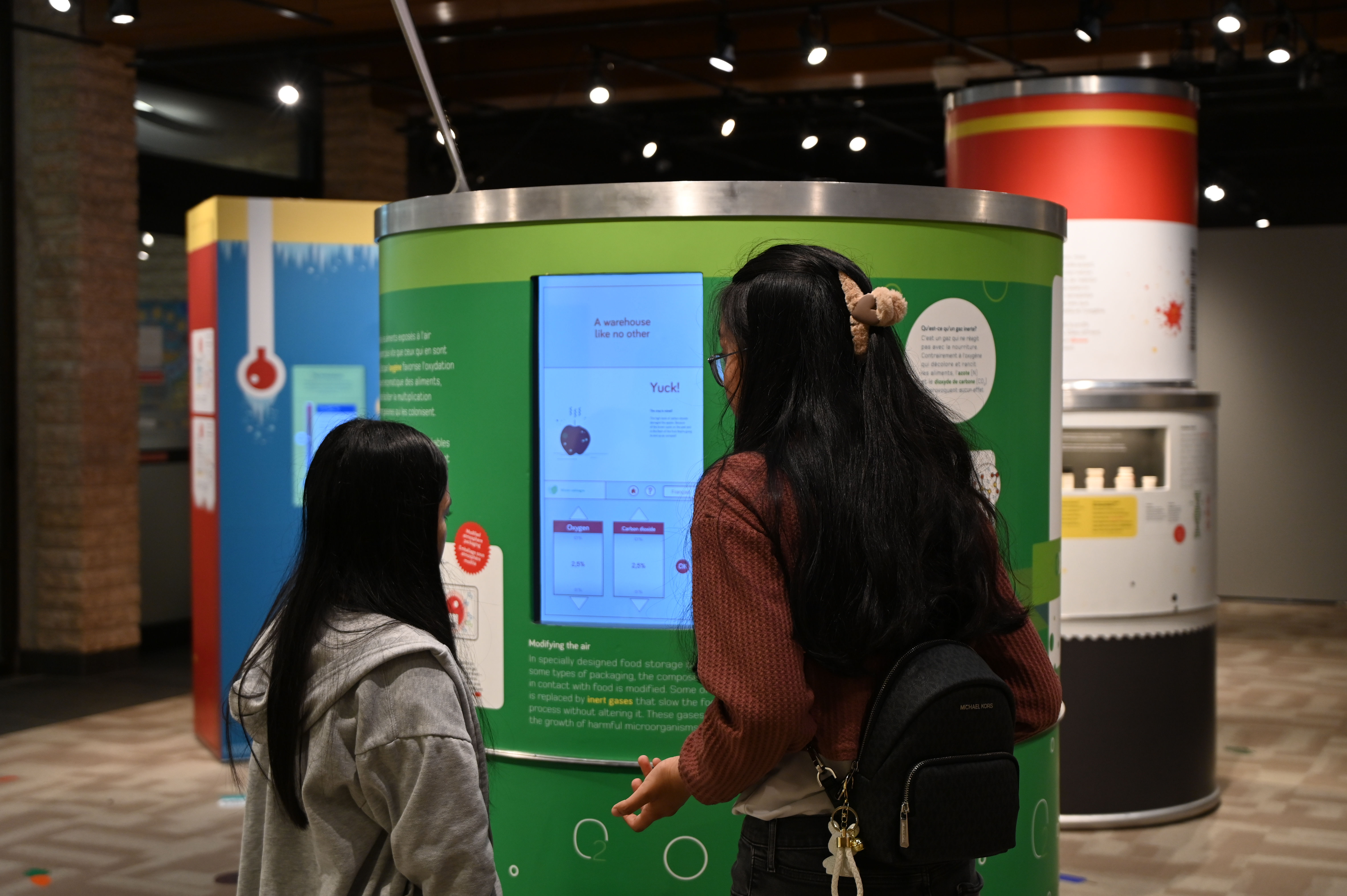 Couple viewing the taste of science exhibit